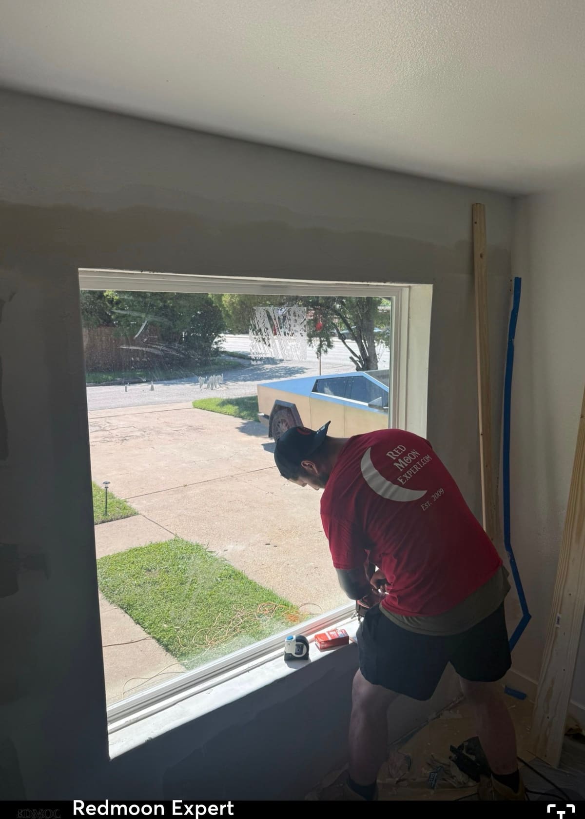 Red Moon Expert craftsman installing a new window